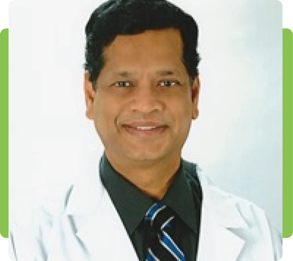 A man in white lab coat and tie.